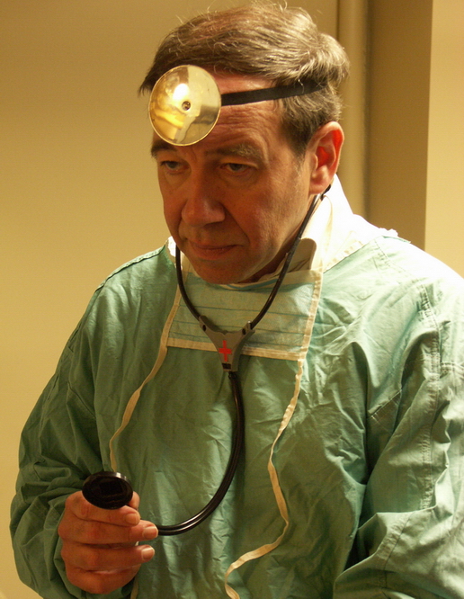 Michael Townsend Wright as a surgeon